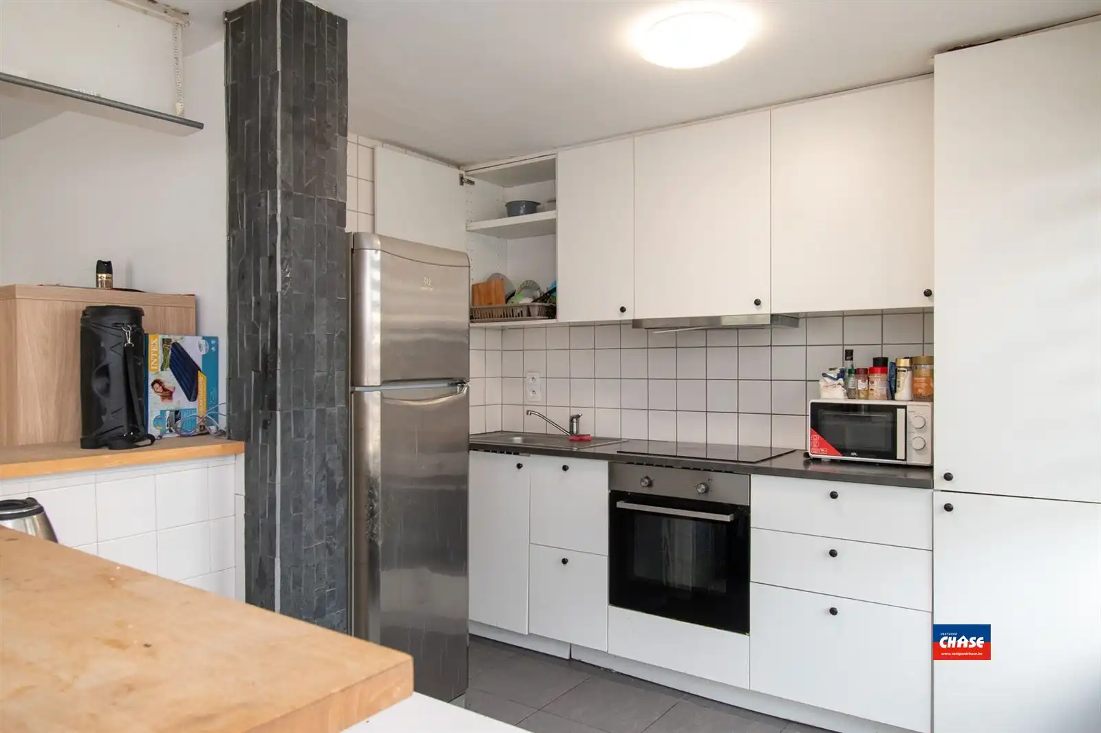 Handelspand met appartement en garagebox foto 14