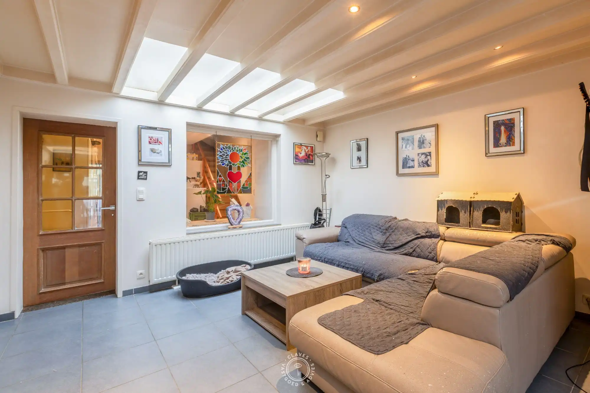 Drieslaapkamer woning met handelsfunctie aan het station van Beveren foto 2