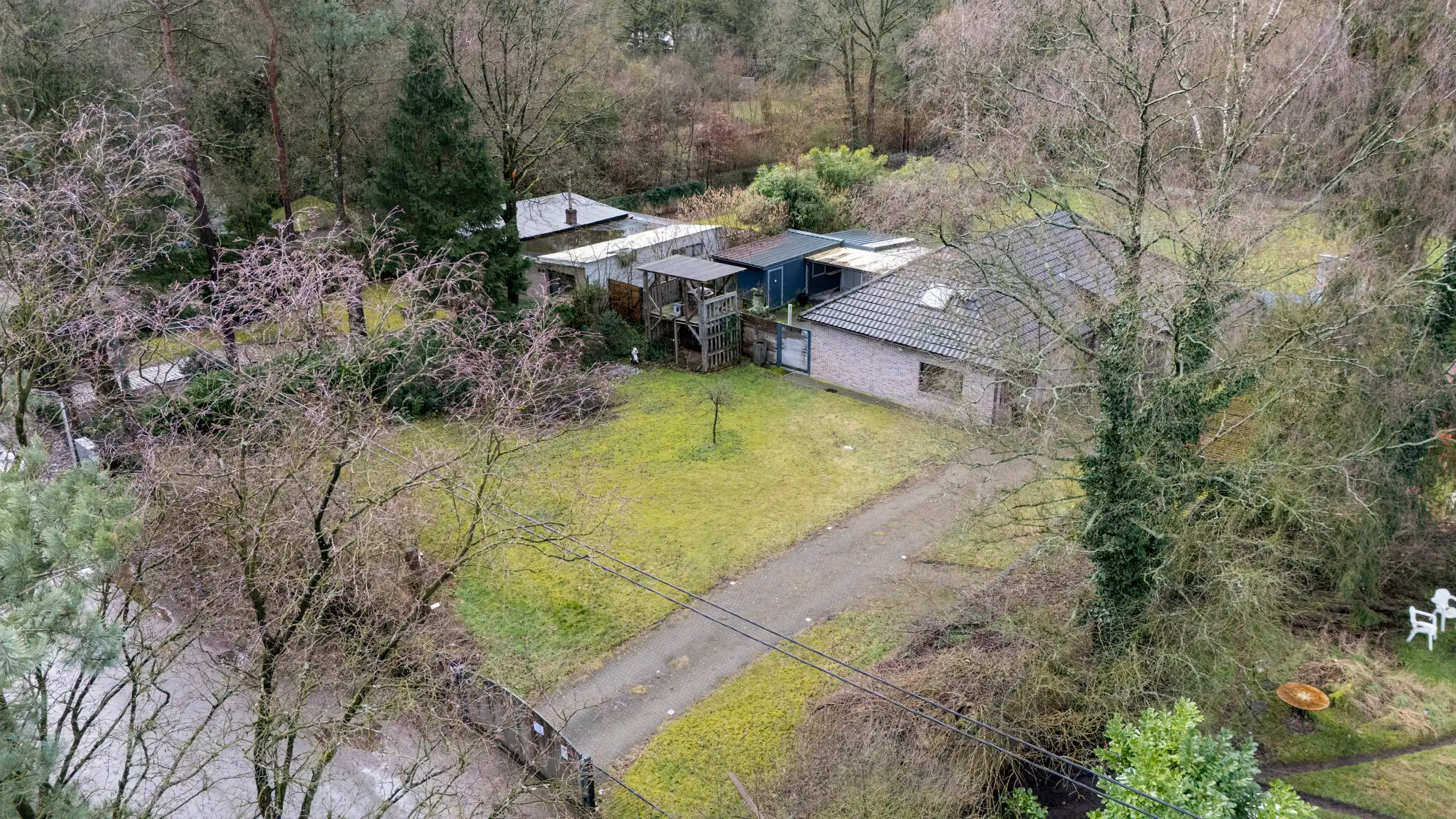 Prachtig perceel bouwgrond 2.475 m² met af te breken woning foto 5