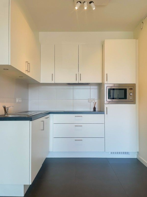 service flat met 1 slaapkamer en tuin + mogelijkheid tot parkeerplaats foto 4