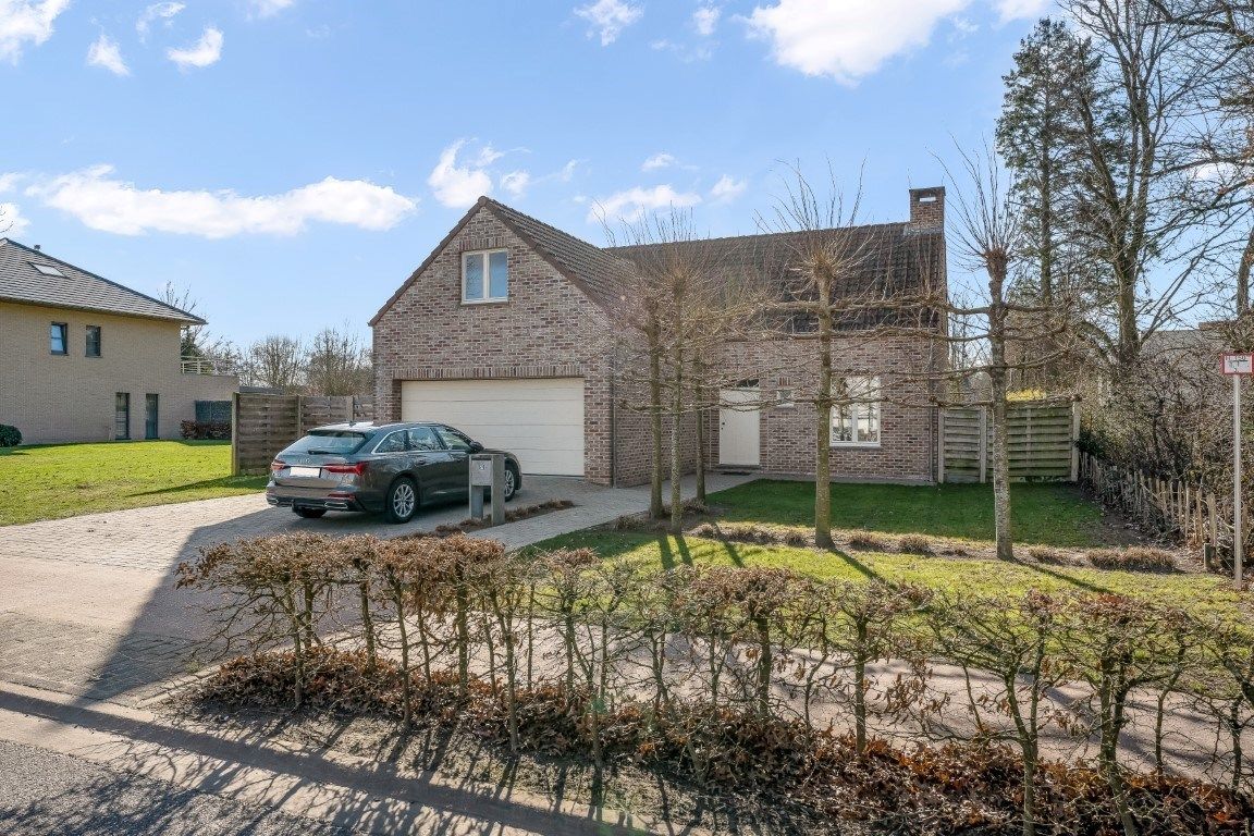 Ruim ingedeelde volledig onderkelderde woning met oa 4 slpks op 23are foto 38