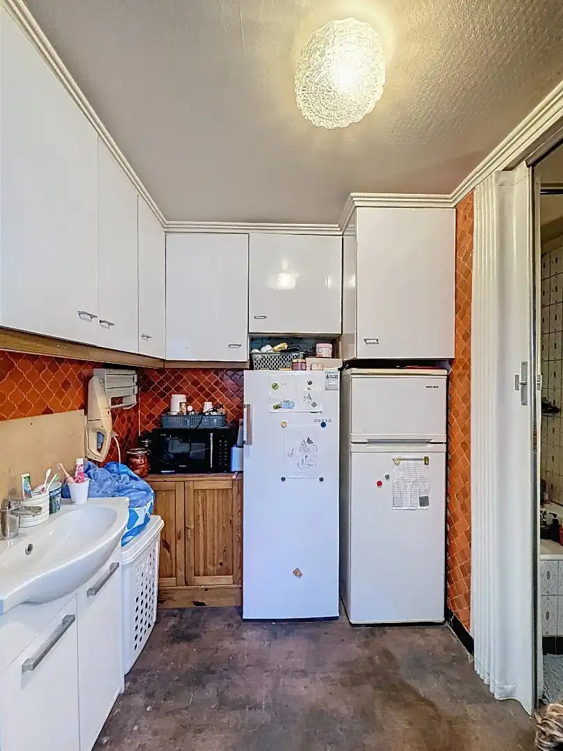 Gezellig wonen in Tienen: praktische rijwoning met terras en 3 slaapkamers foto 8