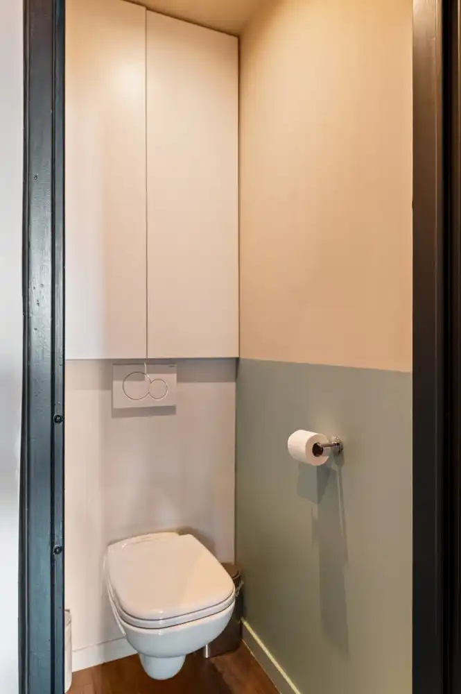 Keurig gerenoveerd, gelijkvloers appt. met 2 slpk., terrasje en garagebox foto 13