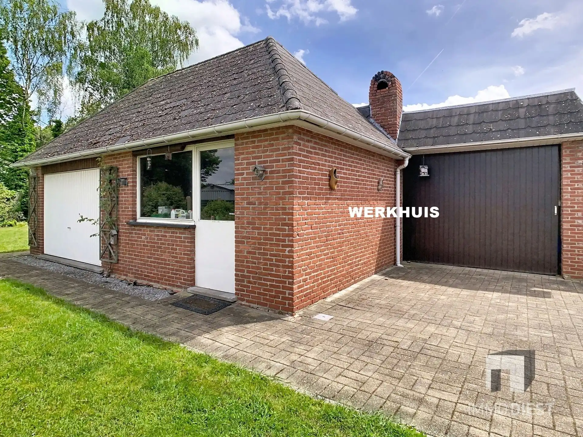 Statige splitlevel met 3 slpk + werkhuis foto 45