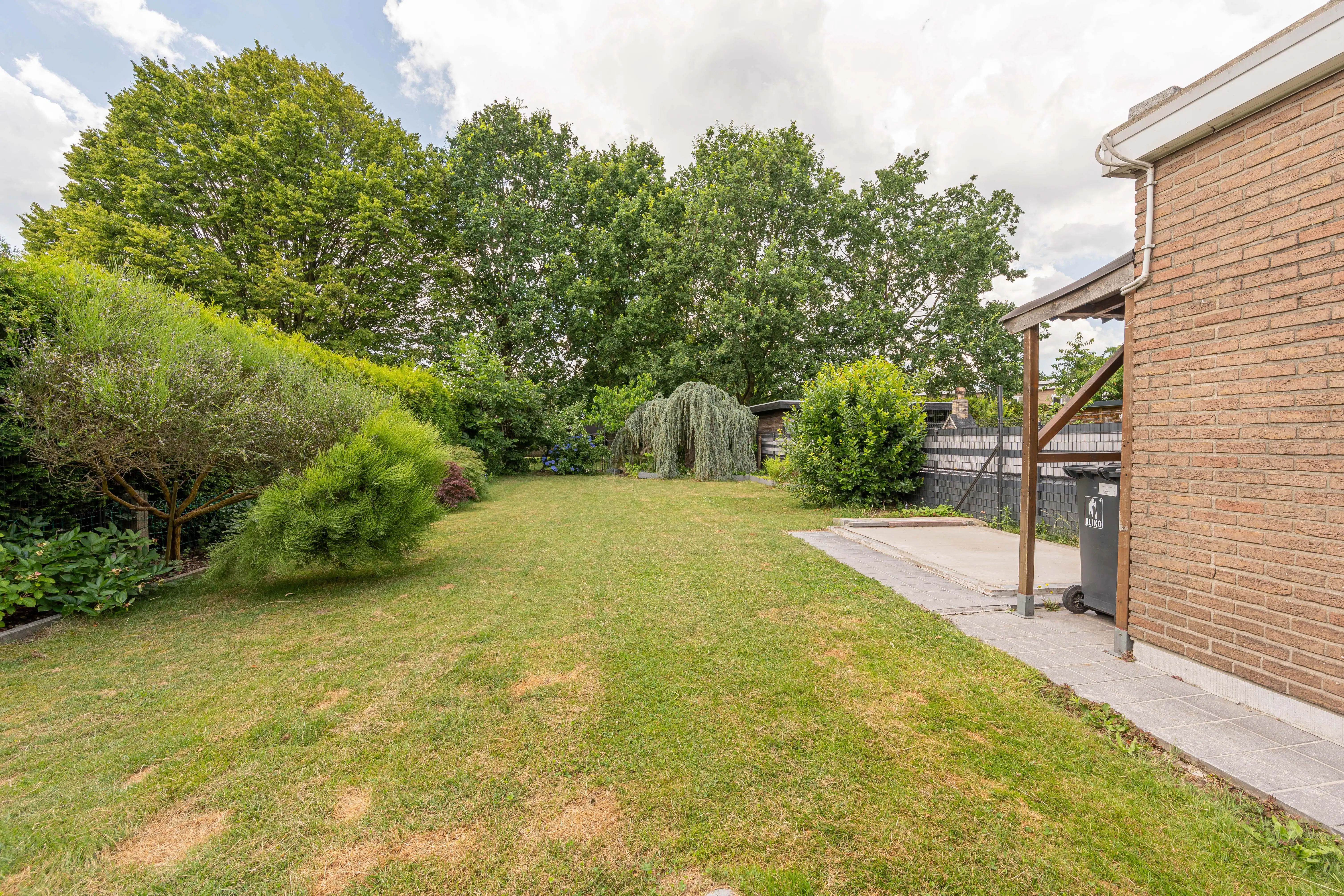 Trendy instapklare gezinswoning met ruime en groene tuin! foto 5