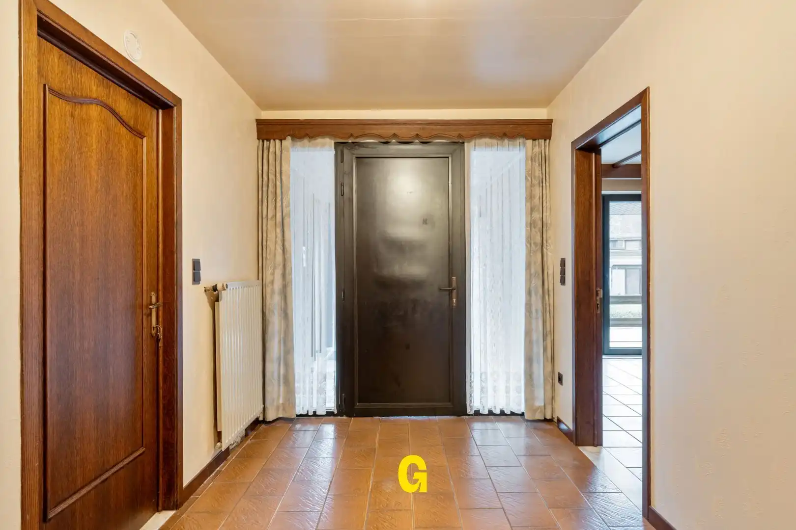 Op te frissen 3-slaapkamer appartement (124 m²) met terras, tuin en garage op wandelafstand van het centrum foto 9