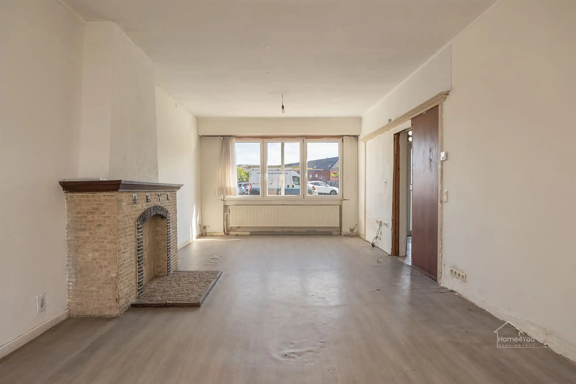 Op te frissen woning met zéér ruime extra zolder foto 5