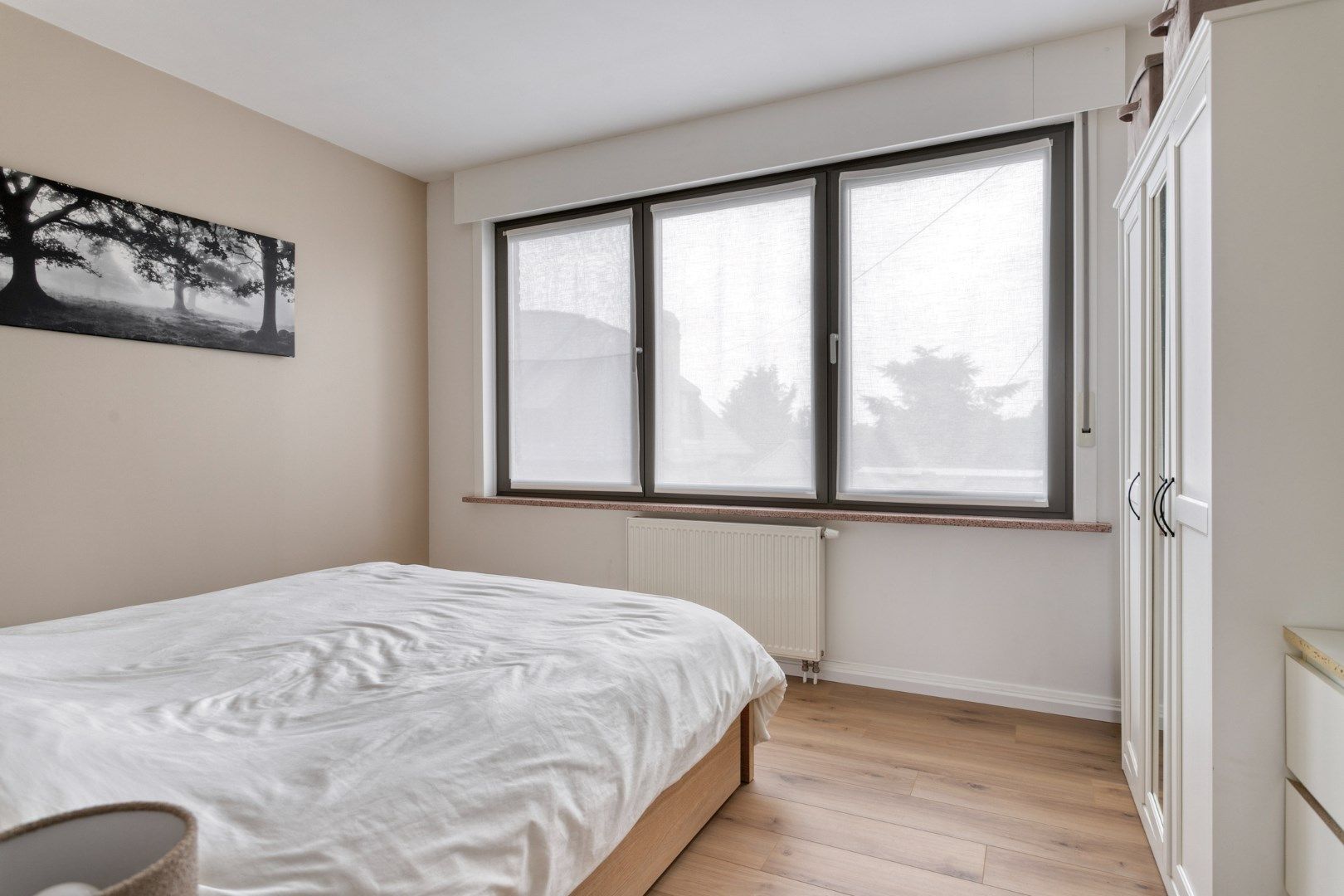 Prachtige instapklare woning met 3 slaapkamers en grote tuin! foto 8