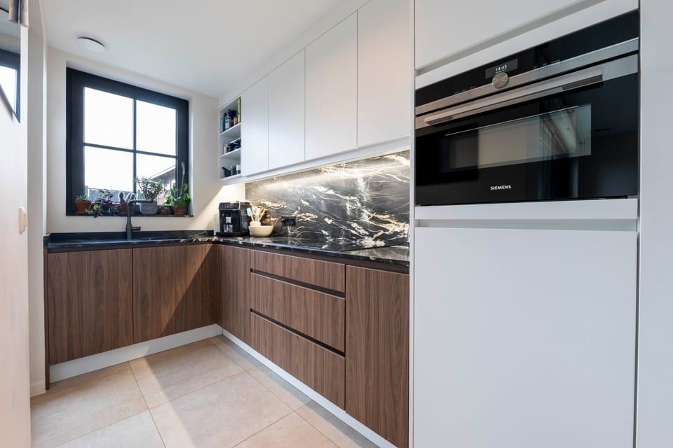 PRACHTIG NIEUWBOUWAPPARTEMENT MET 2 SLKS EN EEN STAANPLAATS IN HET LANDELIJKE HEERS foto 12