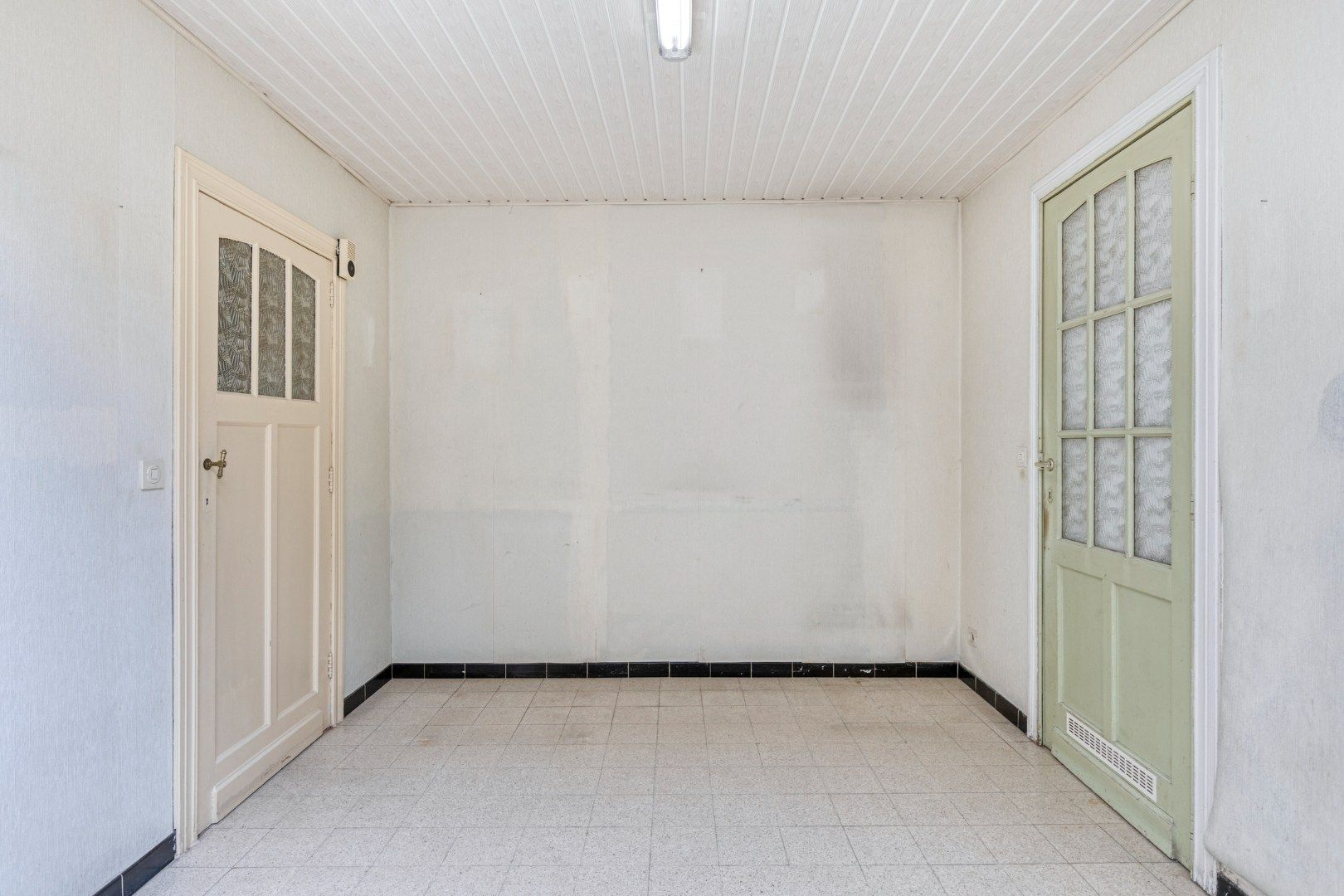 Te renoveren woning met 4 slaapkamers, garage en tuin in Kessel-Lo – EPC 906 kWh/m² - bewoonbare opp. 163 m² foto 9