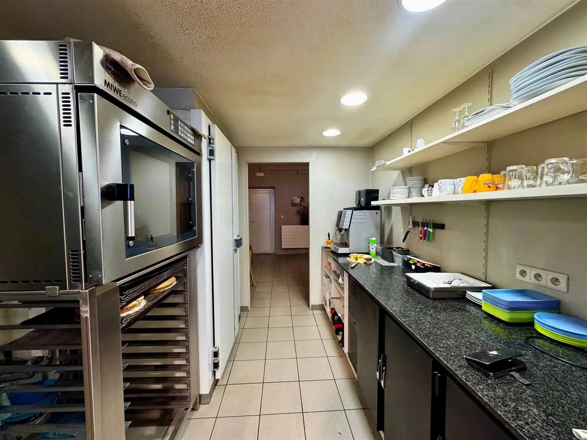 Opbrengsteigendom: handelspand met 2 appartementen  foto 9