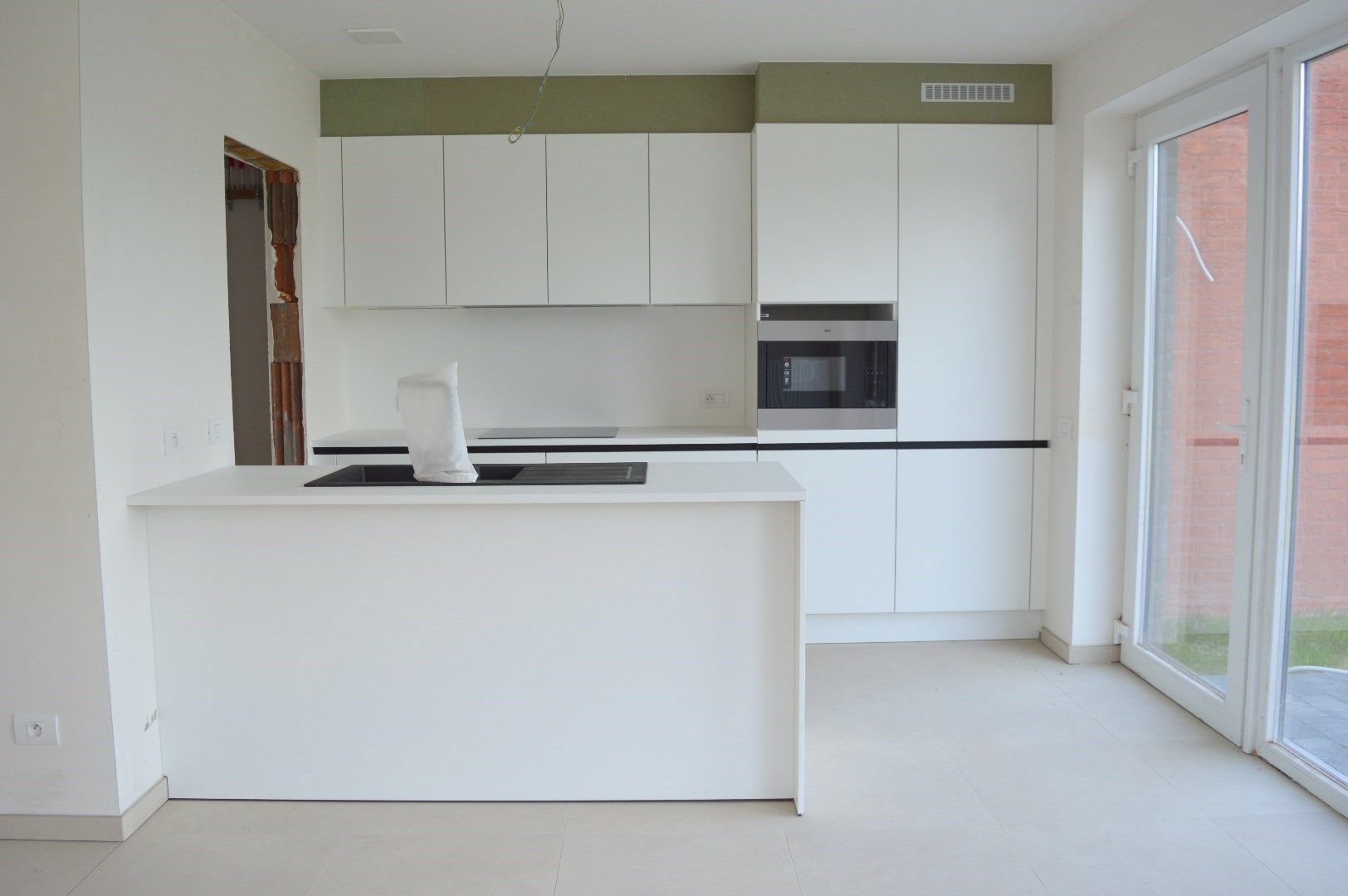 Instapklare woning met 3 slaapkamers en carport in kindvriendelijke ligging te Heule foto 4