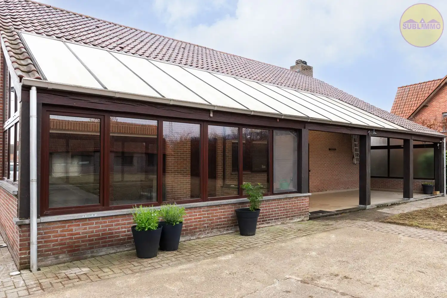 Open bebouwing met ruim bijgebouw op een perceel van 1.100 m² in Geel foto 2