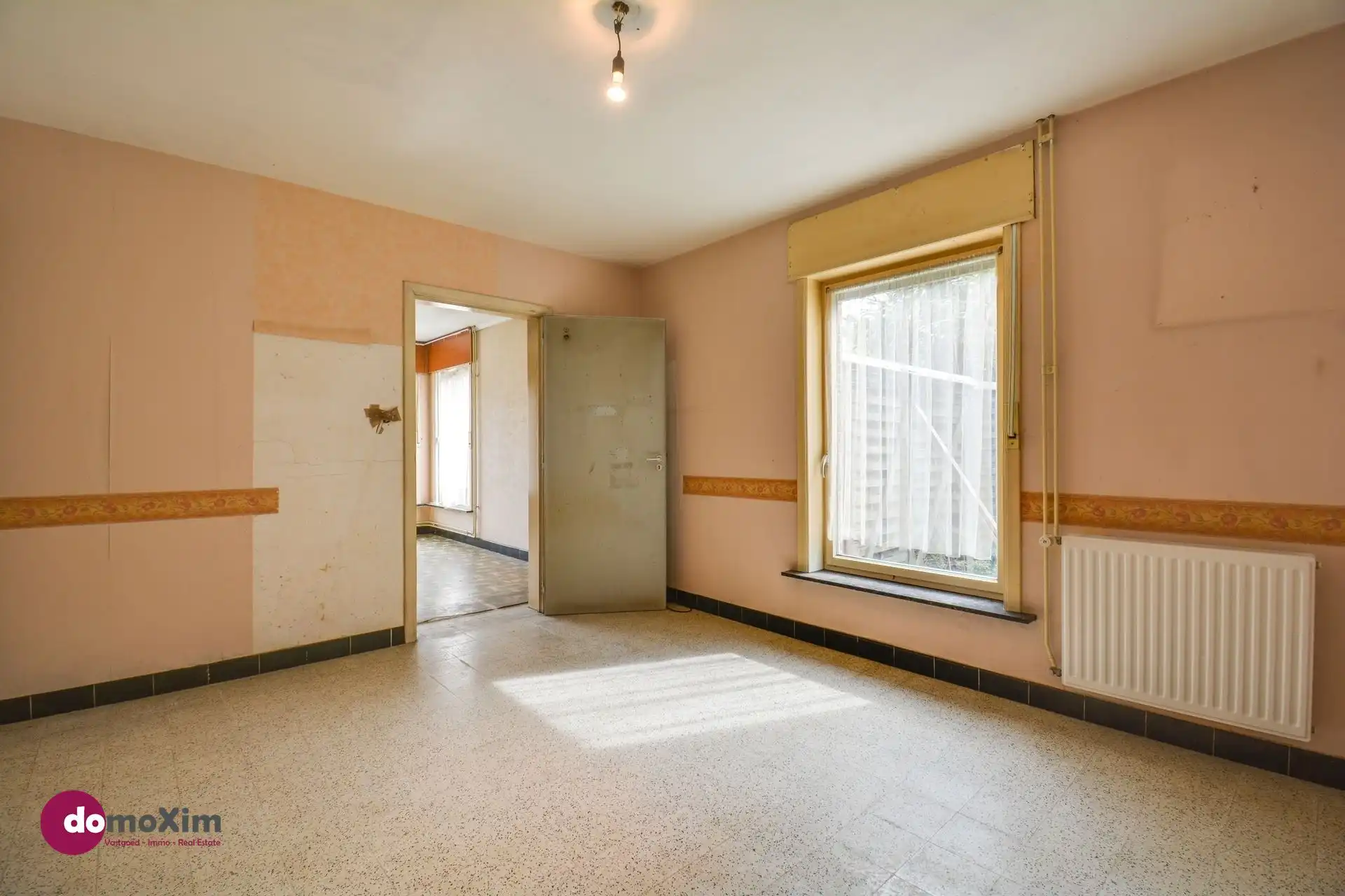 Te renoveren woning met garage in Boortmeerbeek foto 12