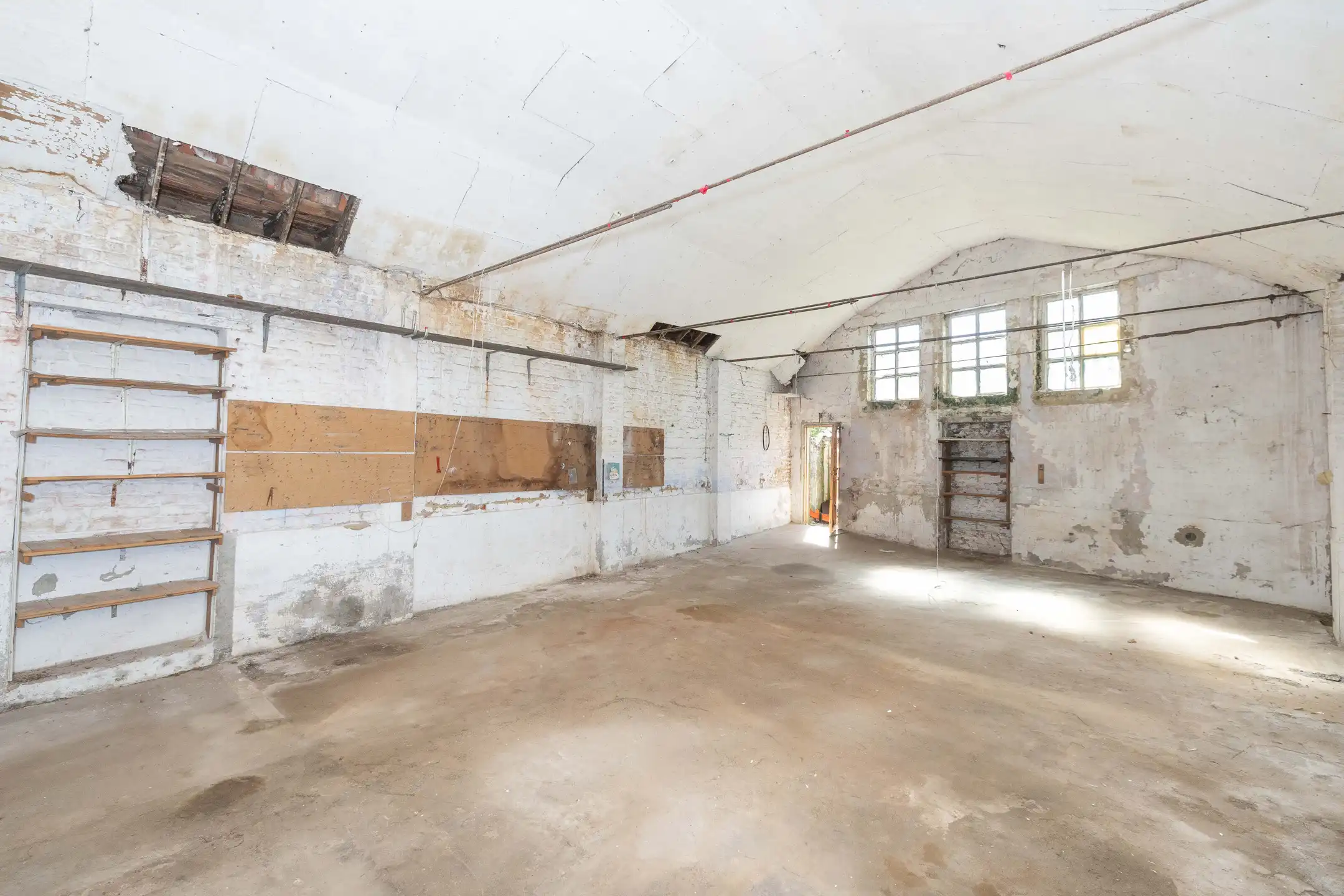 Te renoveren woonhuis met winkel foto 14