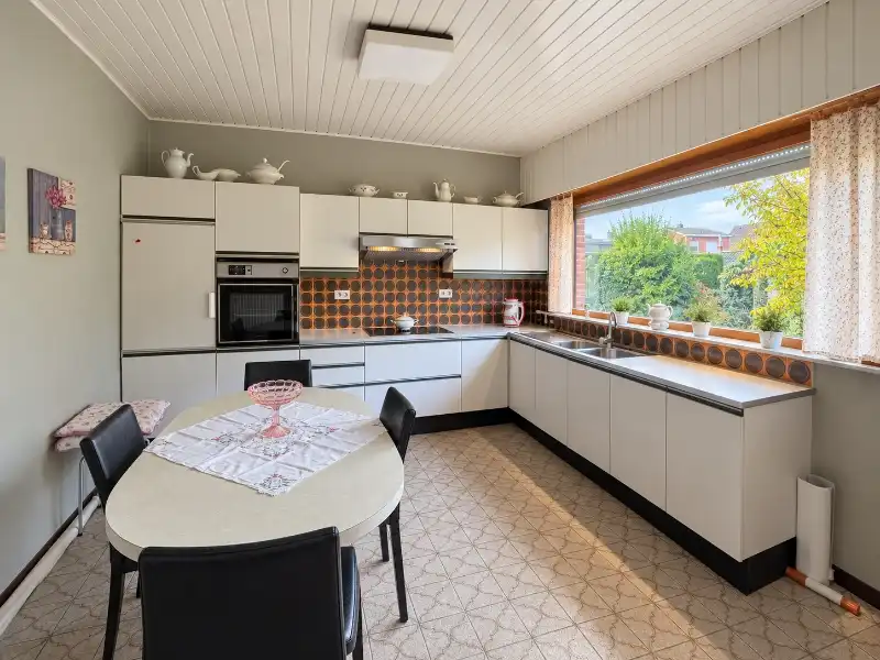 Ruime woning op 1.000 m² met park achter de tuin en 4 slaapkamers foto 7