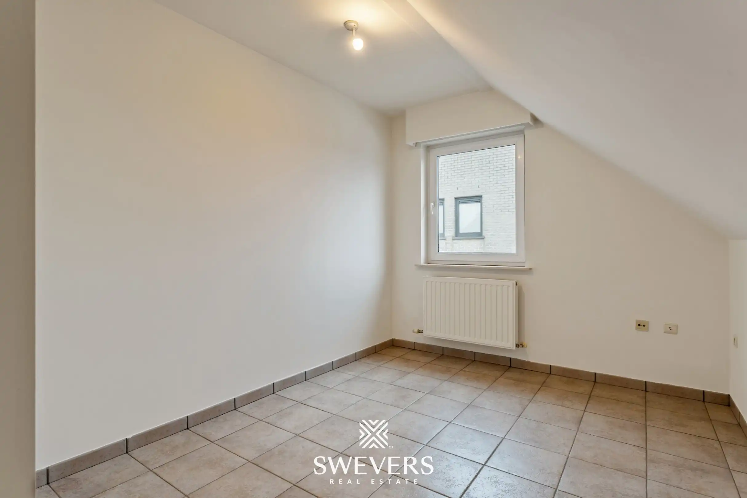 Ruim duplex appartement met 2 slaapkamers, terras en garage in Heusden-Zolder foto 12