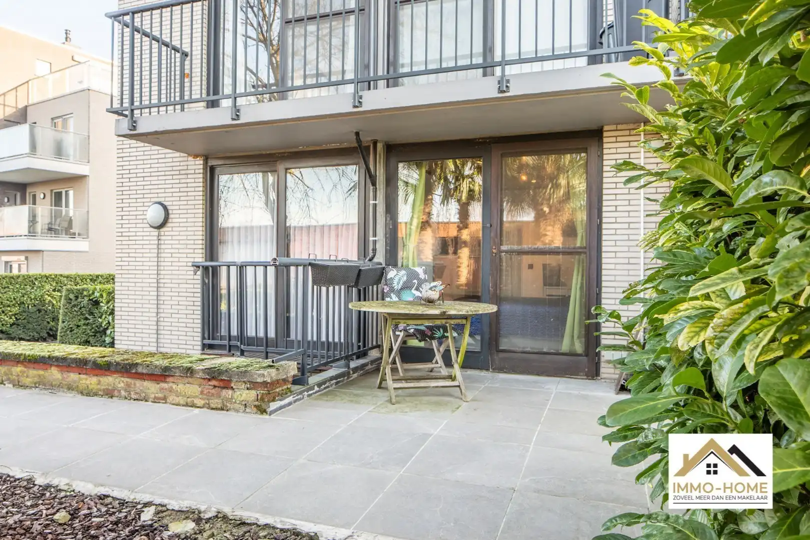 Zeer ruim gelijkvloers appartement met woonkelder en private tuin  foto 2