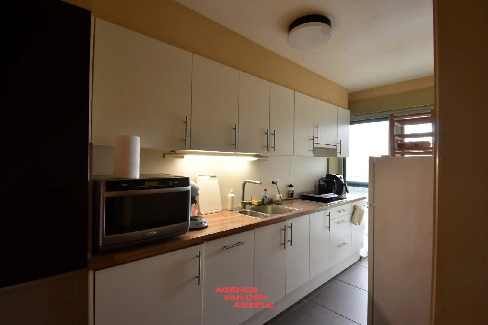 Uitzonderlijk breed appartement met 2 slaapkamers en terras foto 5