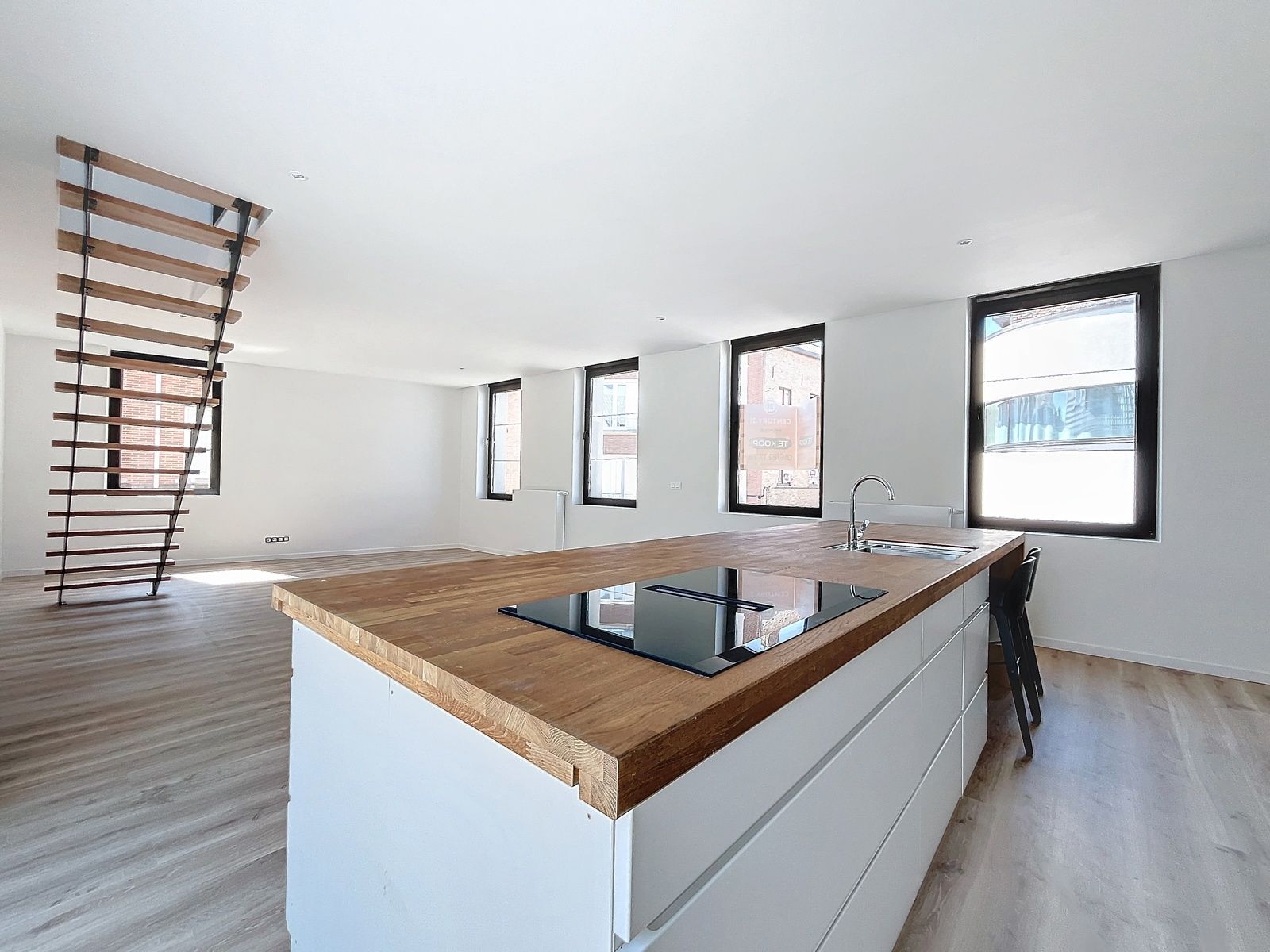 Duplex appartement met 4 slaapkamers en terras nabij centrum foto {{pictureIndex}}