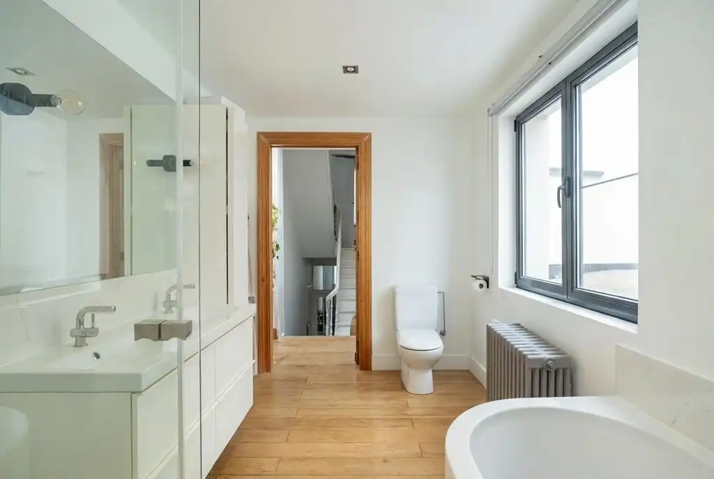 Sfeervol, instapklaar herenhuis met 4 slaapkamers & mediterraanse tuin in hartje Harmoniewijk foto 13