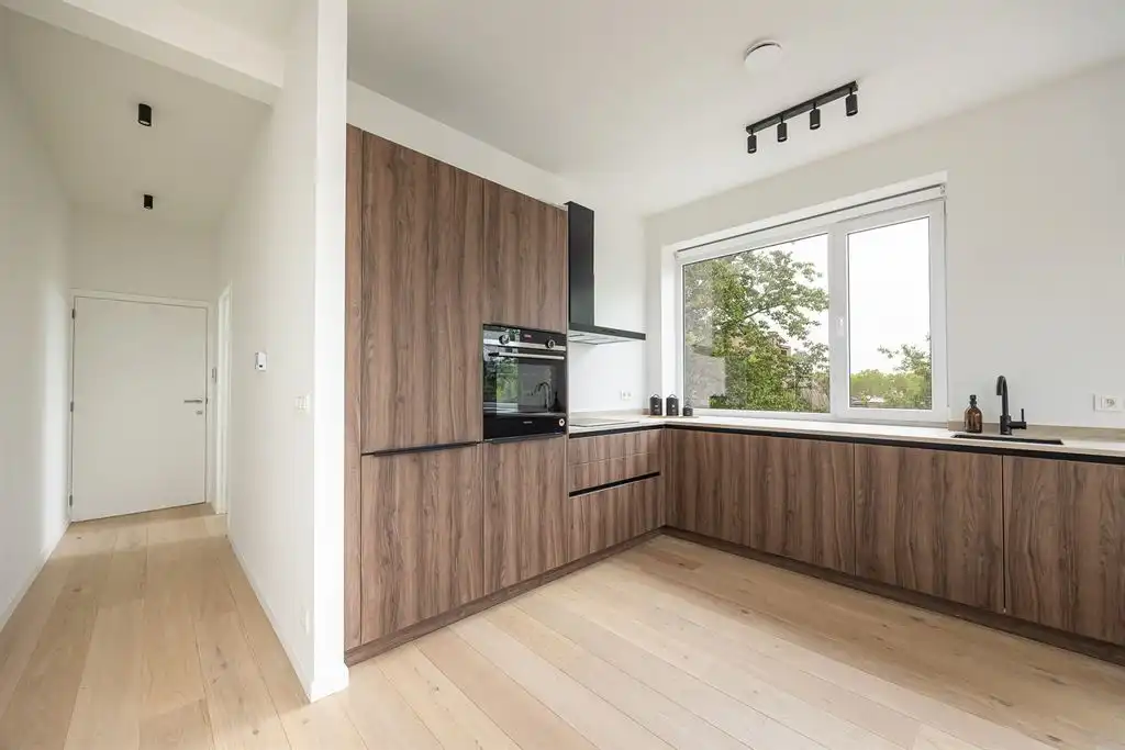 Stijlvol nieuwbouwappartement met terras foto 8
