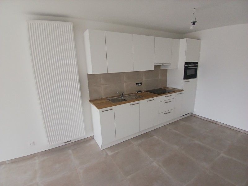Gelijkvloers nieuwbouw appartement met terras en tuin gelegen in het centrum van Opglabbeek foto 6