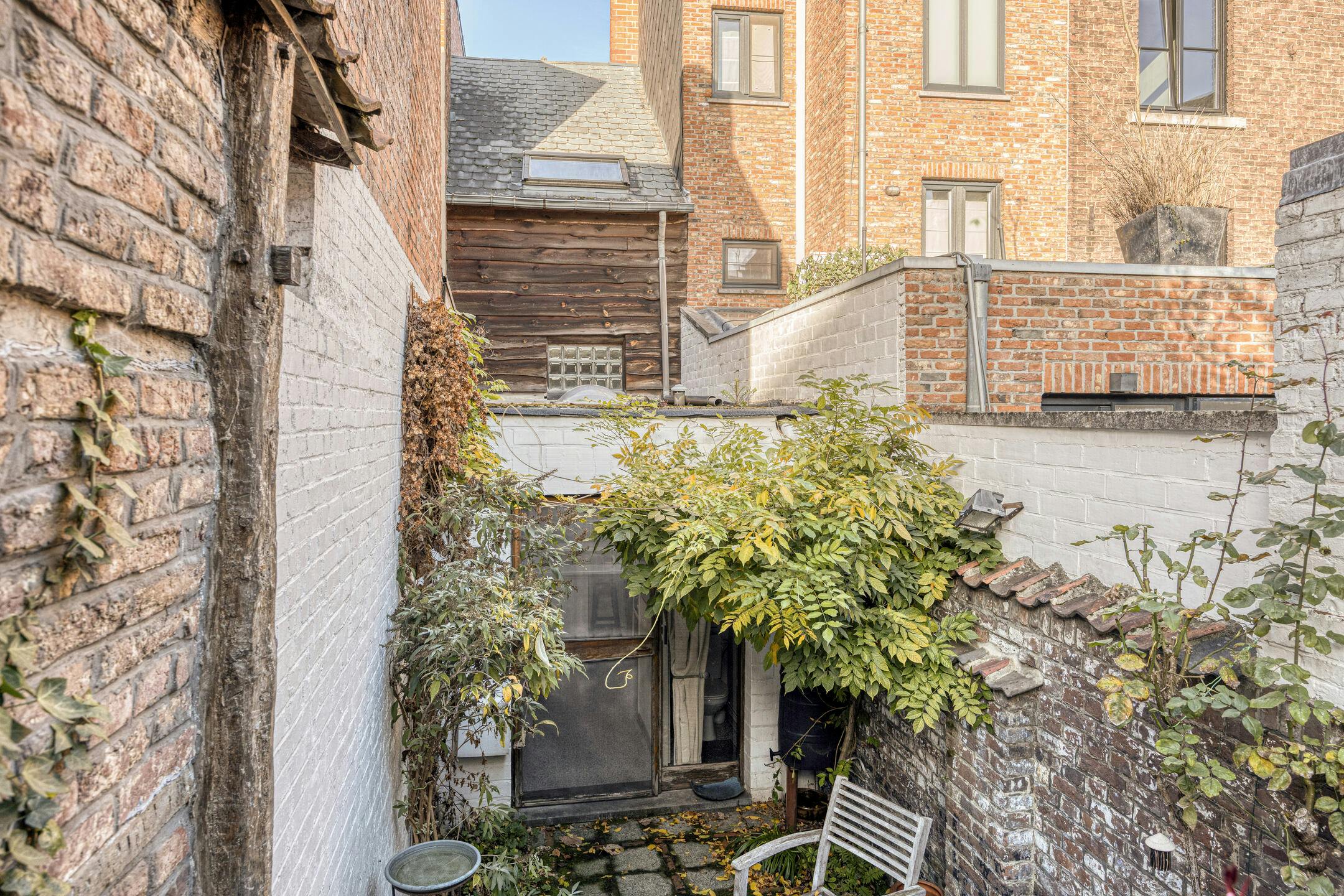 Op te knappen stadswoning met tuin in hartje Hasselt	 foto 18