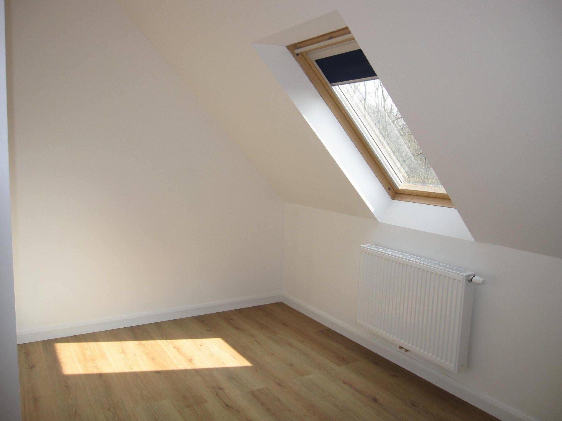 Ruim duplex-appartement met ondergrondse staanplaats en berging foto 7