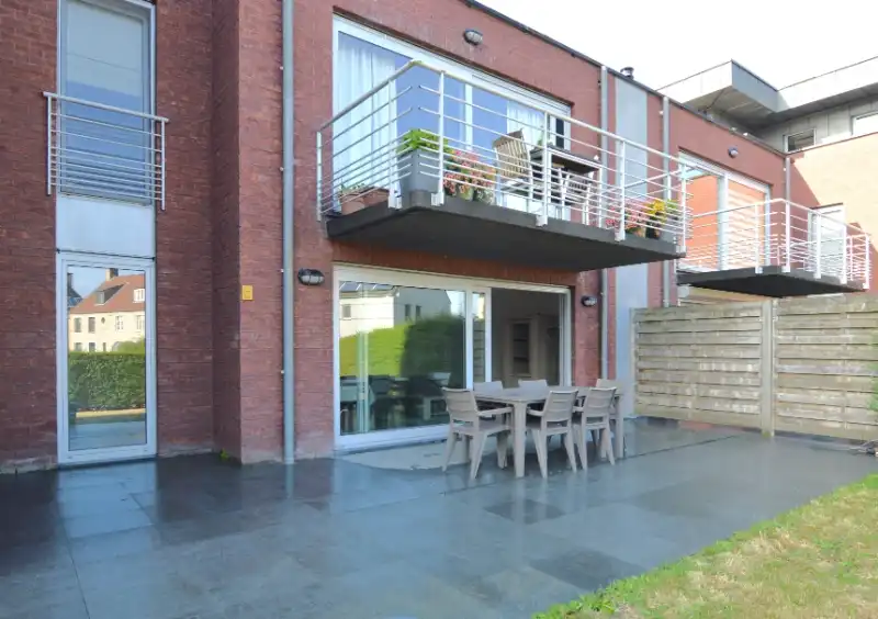 Gemeubeld gelijkvloers appartement met tuin – Heffen foto 14