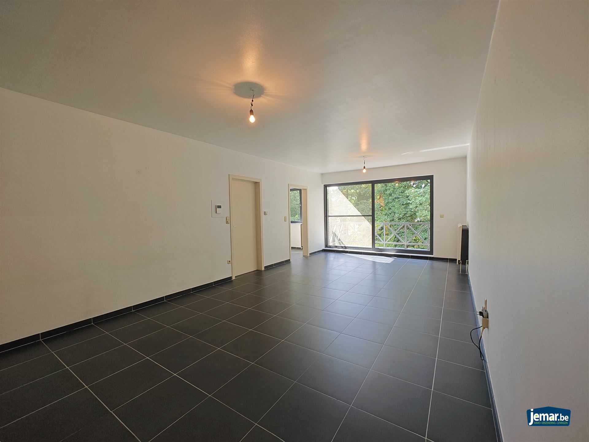 Instapklaar gerenoveerd appartement met 2 slaapkamers, ondergrondsparking en  berging  foto 4