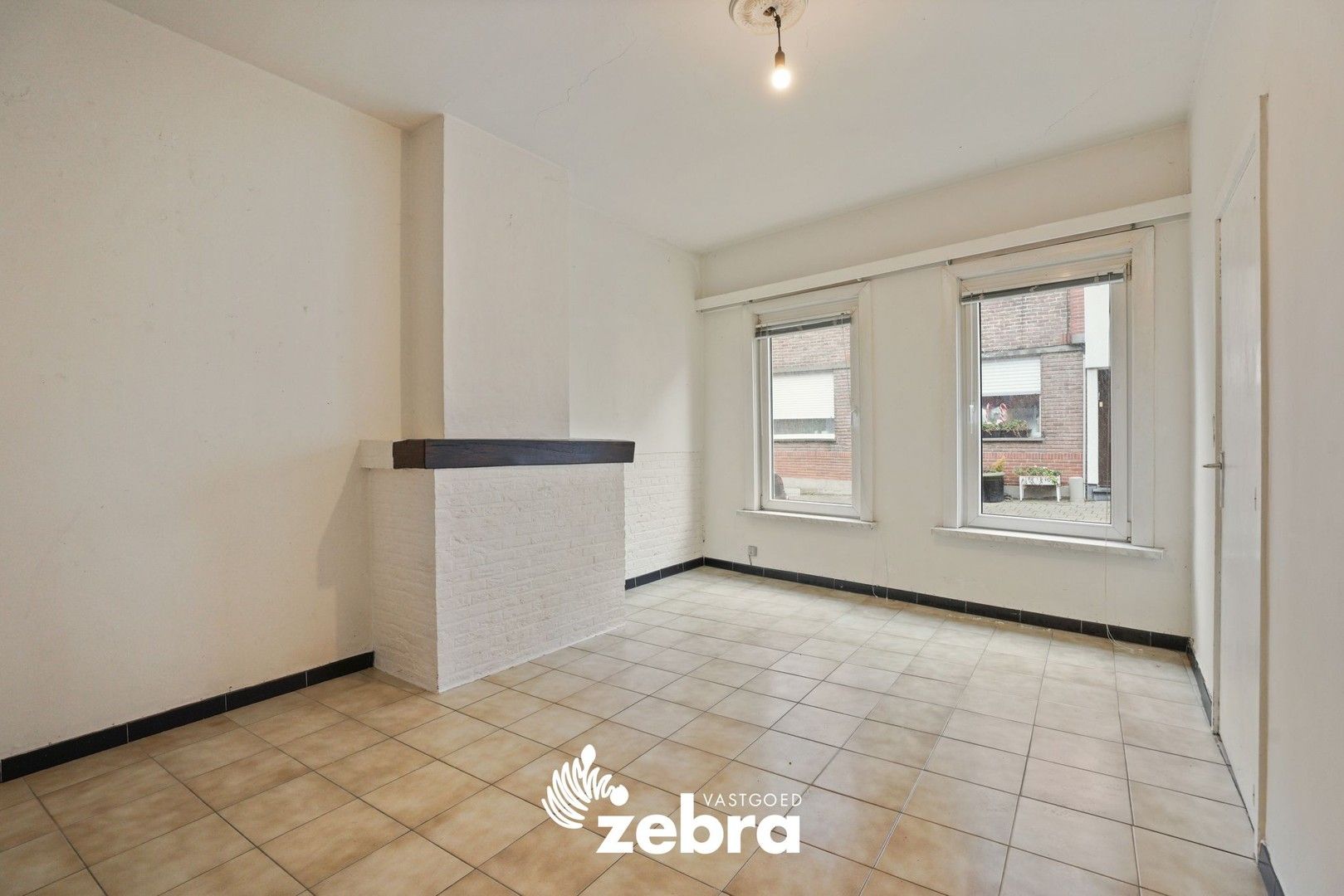 Deels gerenoveerde woning met twee slaapkamers te centrum Tielt! foto 5