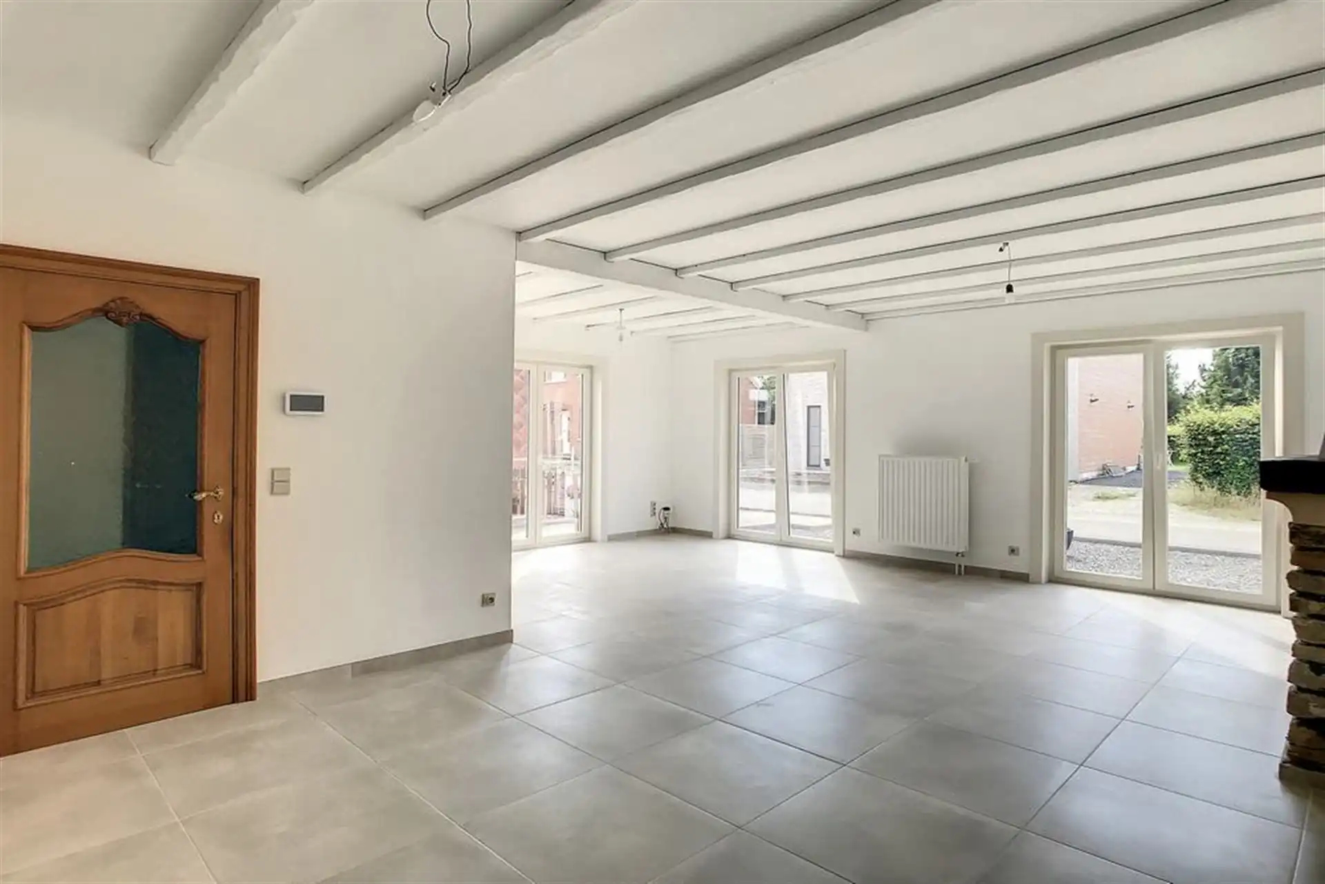 Instapklare half-open bebouwing met 3 slaapkamers en tuin foto 2