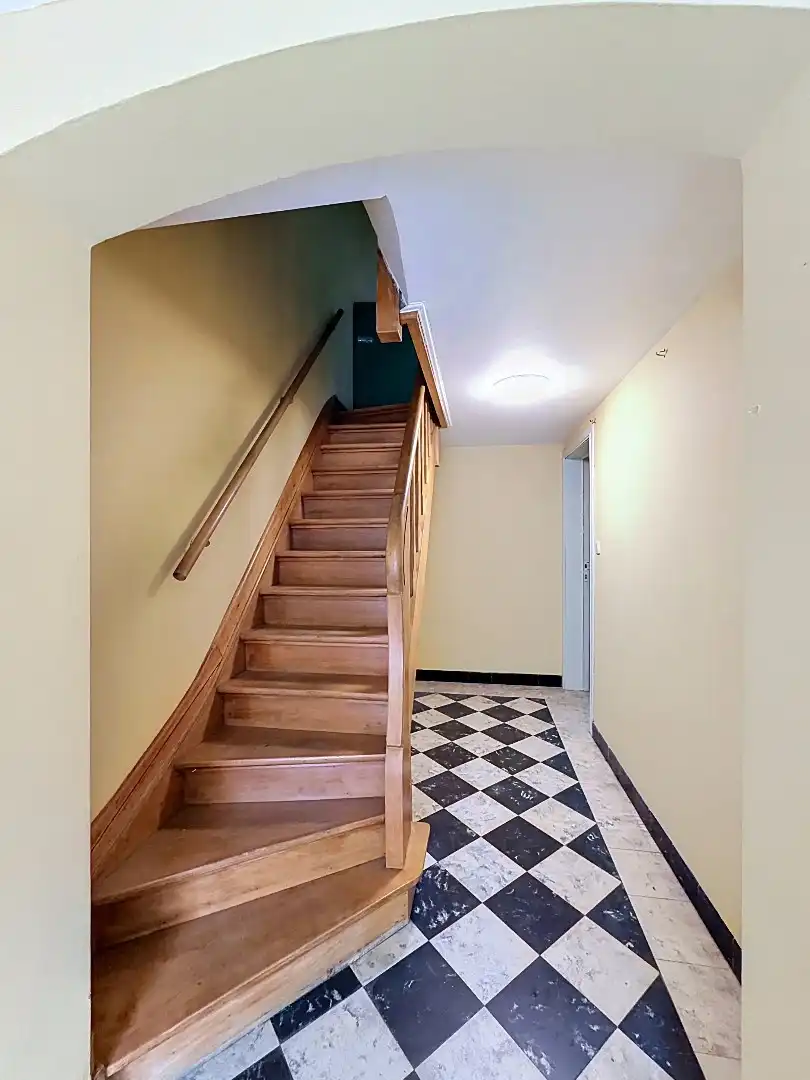 Ruime bel-etagewoning met 4 slaapkamers en grote zuidoostgerichte tuin in Leuven foto 2