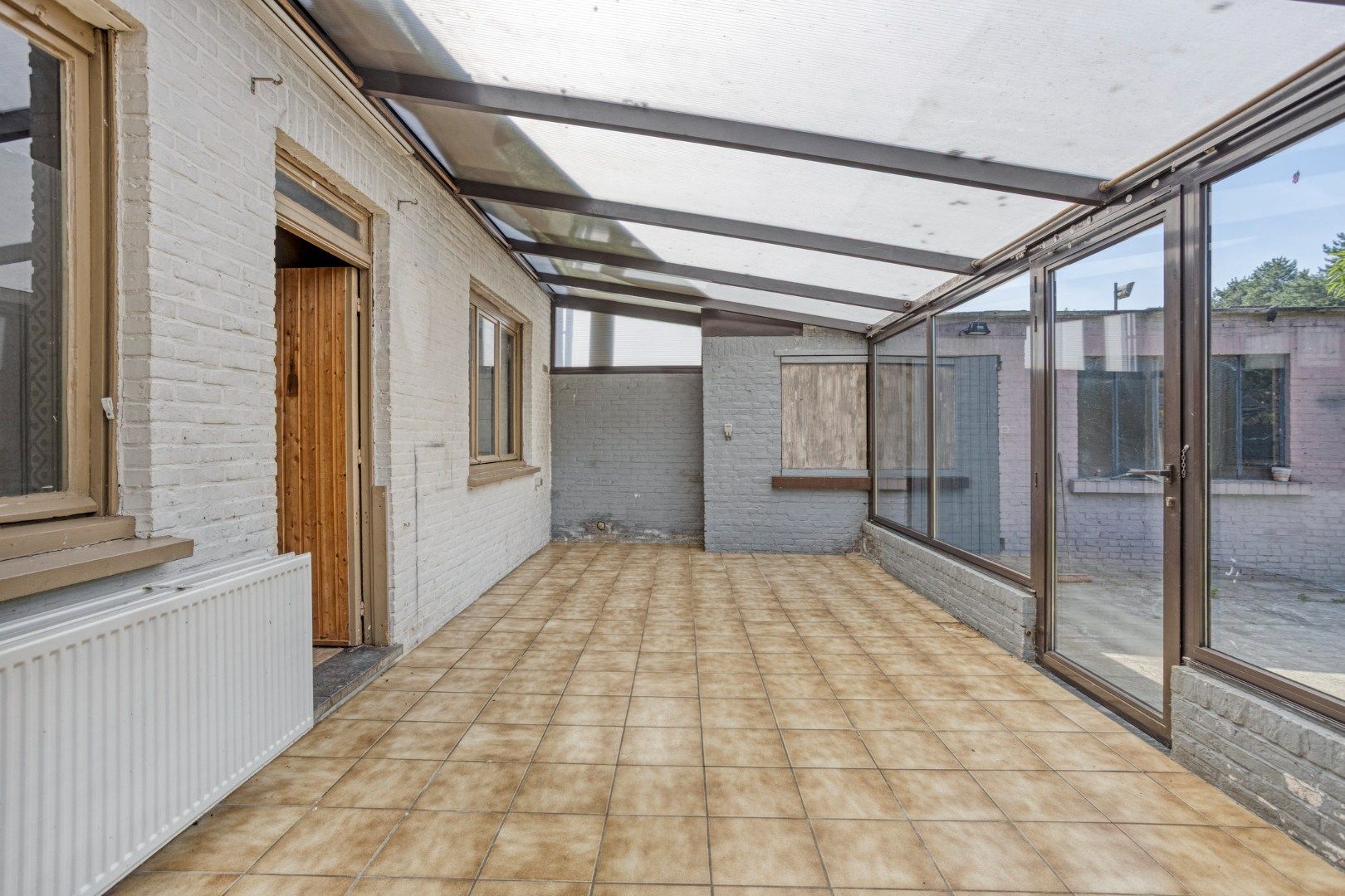 Te renoveren woning, rustig en landelijk gelegen op 1.265 m² nabij het centrum ! foto 14