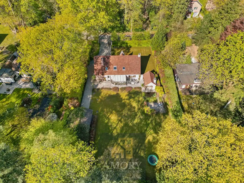 Karaktervolle villa met uitzonderlijke tuin op toplocatie! foto 2