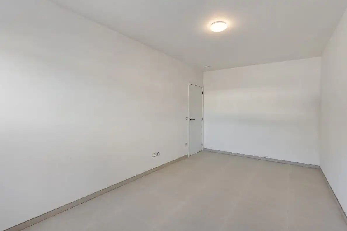 TE KOOP – Ruim nieuwbouw gelijkvloers appartement met tuin en garage in het centrum van Helchteren foto 11