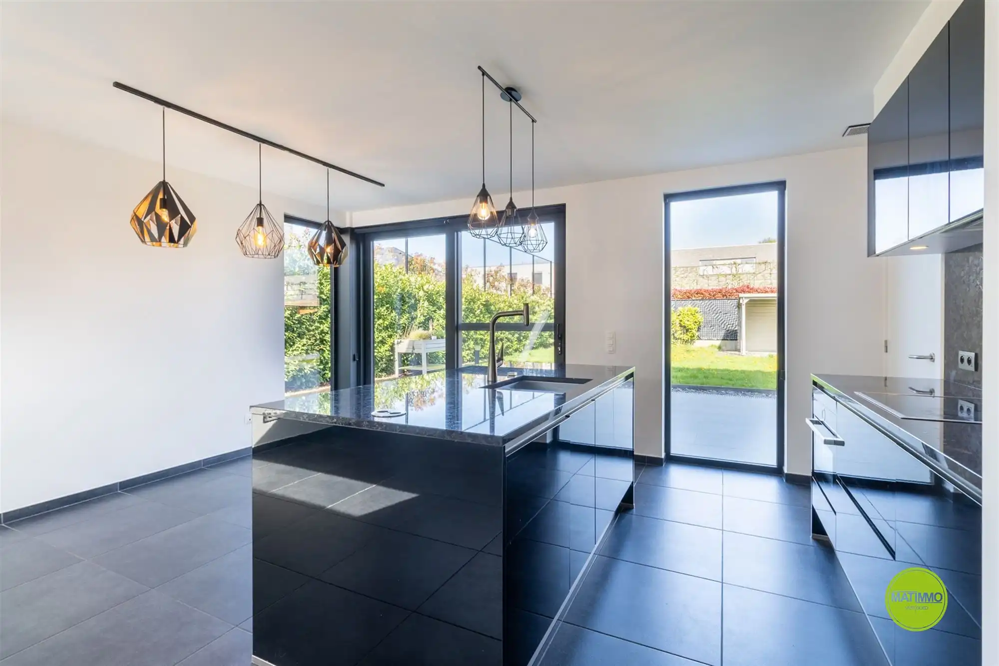 Moderne open bebouwing met 3 slaapkamers en tuin foto 5