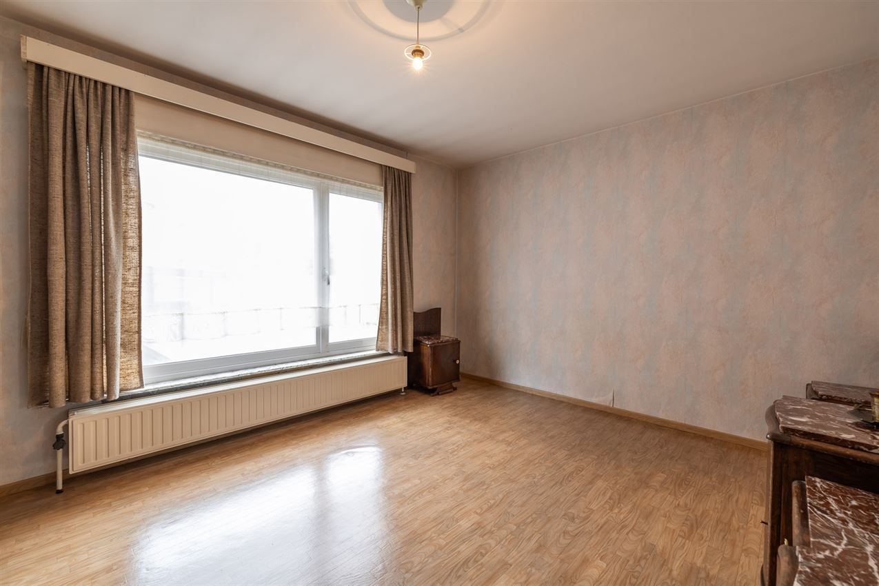 Te renoveren woning met 4 slk. in het hart van Averbode foto 14