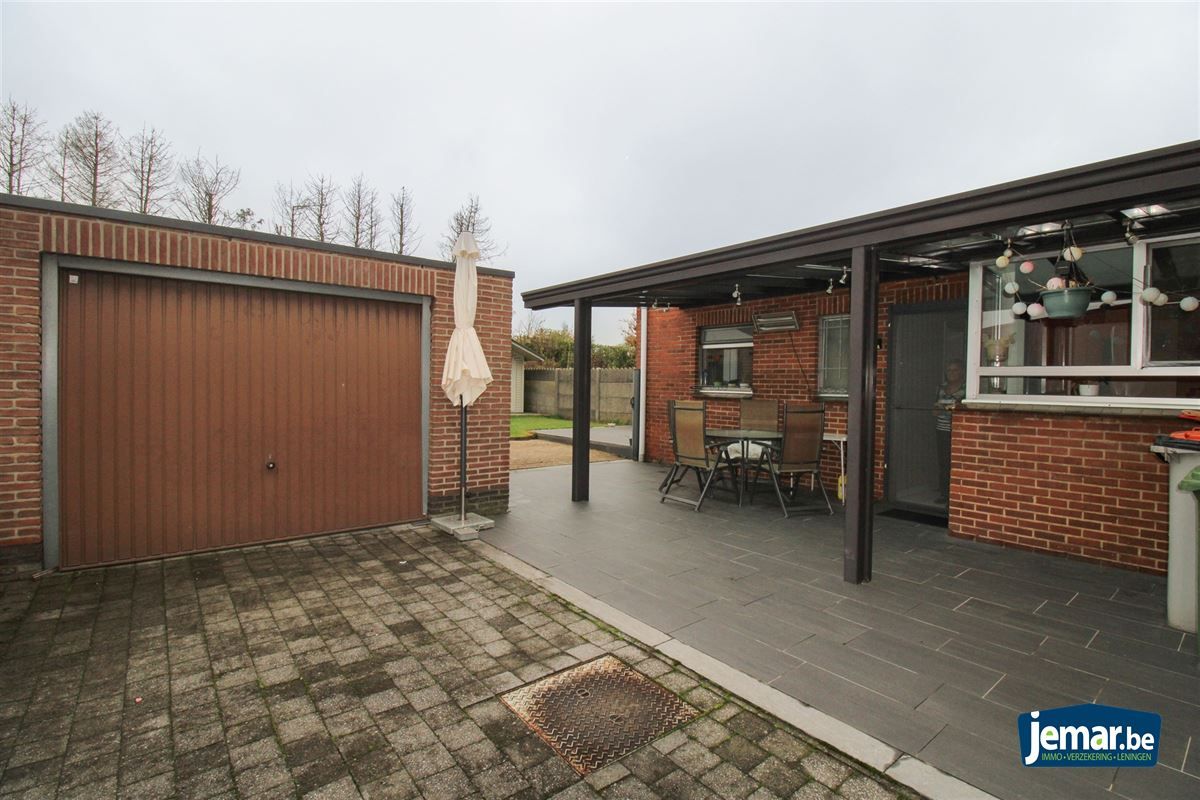 Goed onderhouden gezinswoning met 3 slaapkamers en tuin met vrijstaande garage te Maasmechelen! foto 14