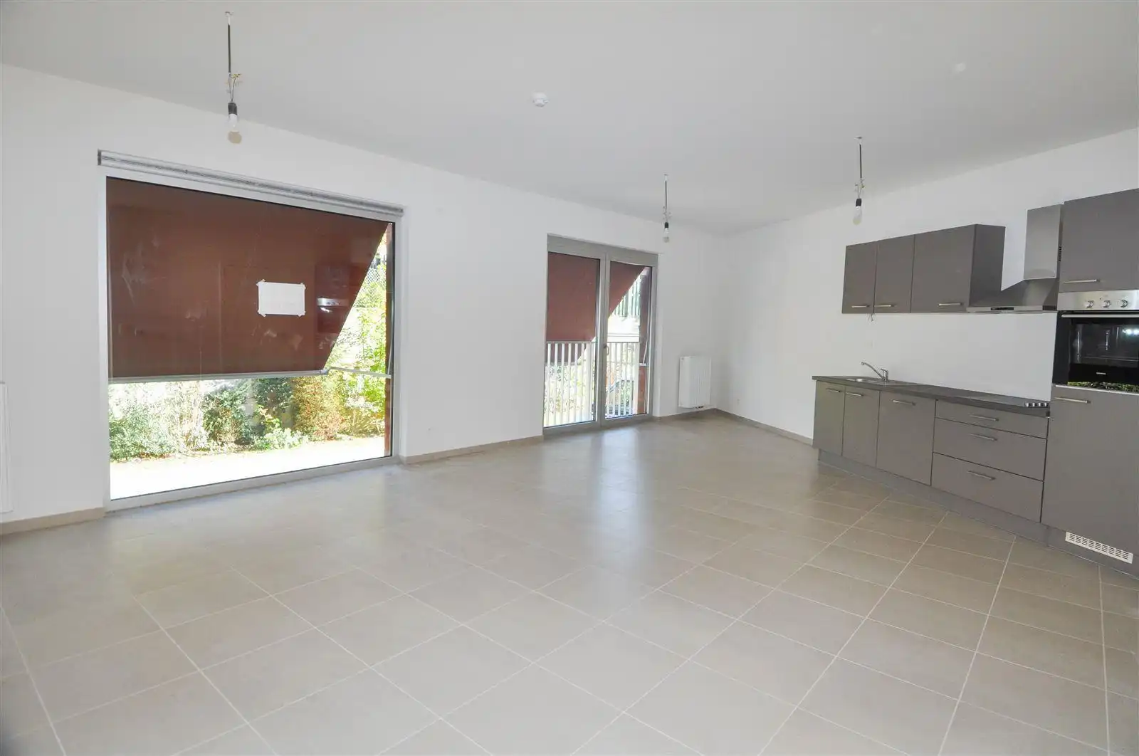 Serviceflat gelijkvloerse verdieping met 1 slaapkamer foto 4