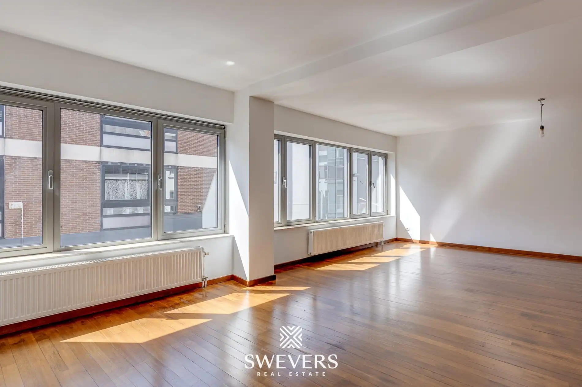 Ruim instapklare duplex-appartement met 3 slaapkamers en lift in centrum Hasselt foto 3