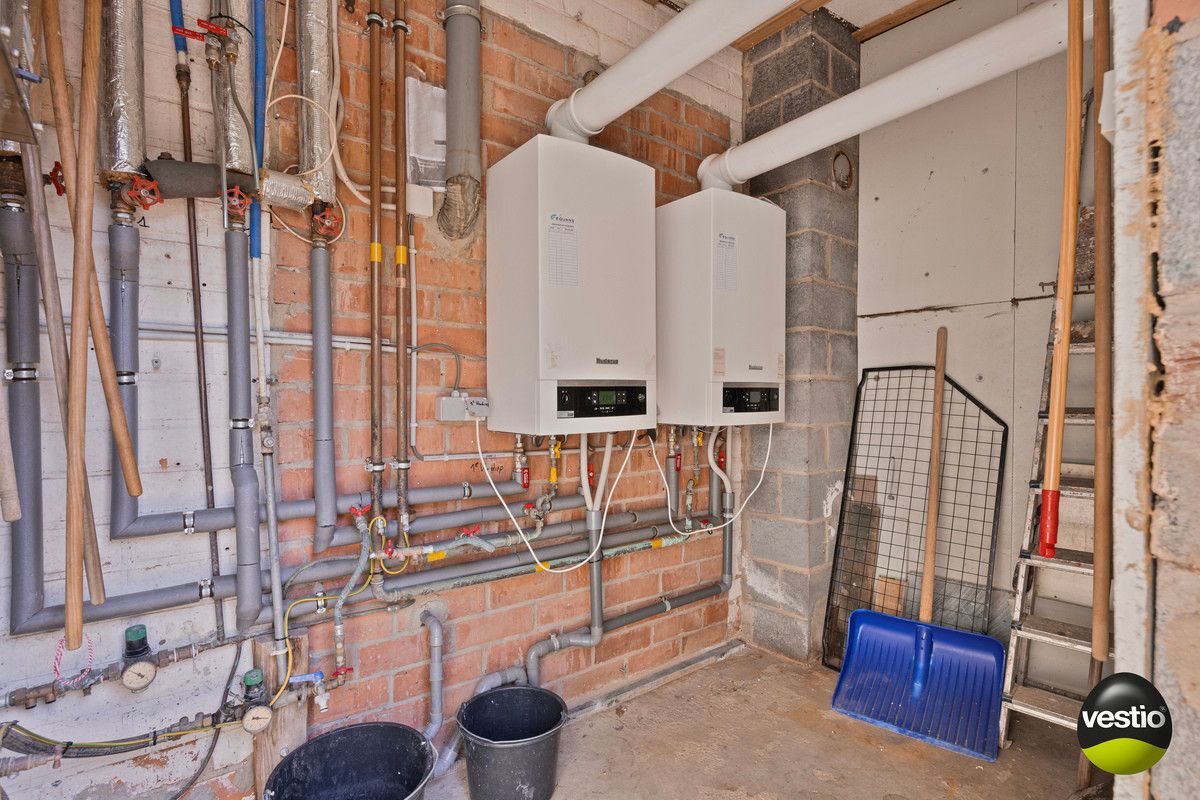 INVESTERINGSPAND MET 2 VERHUURDE APPARTEMENTEN TE RIJKHOVEN. foto 20