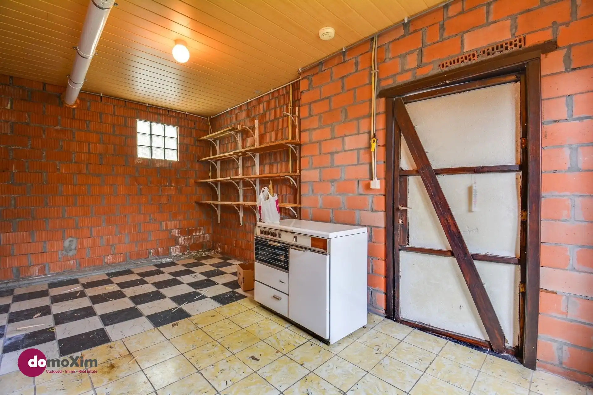 Te renoveren woning op bereikbare locatie in Boortmeerbeek foto 17