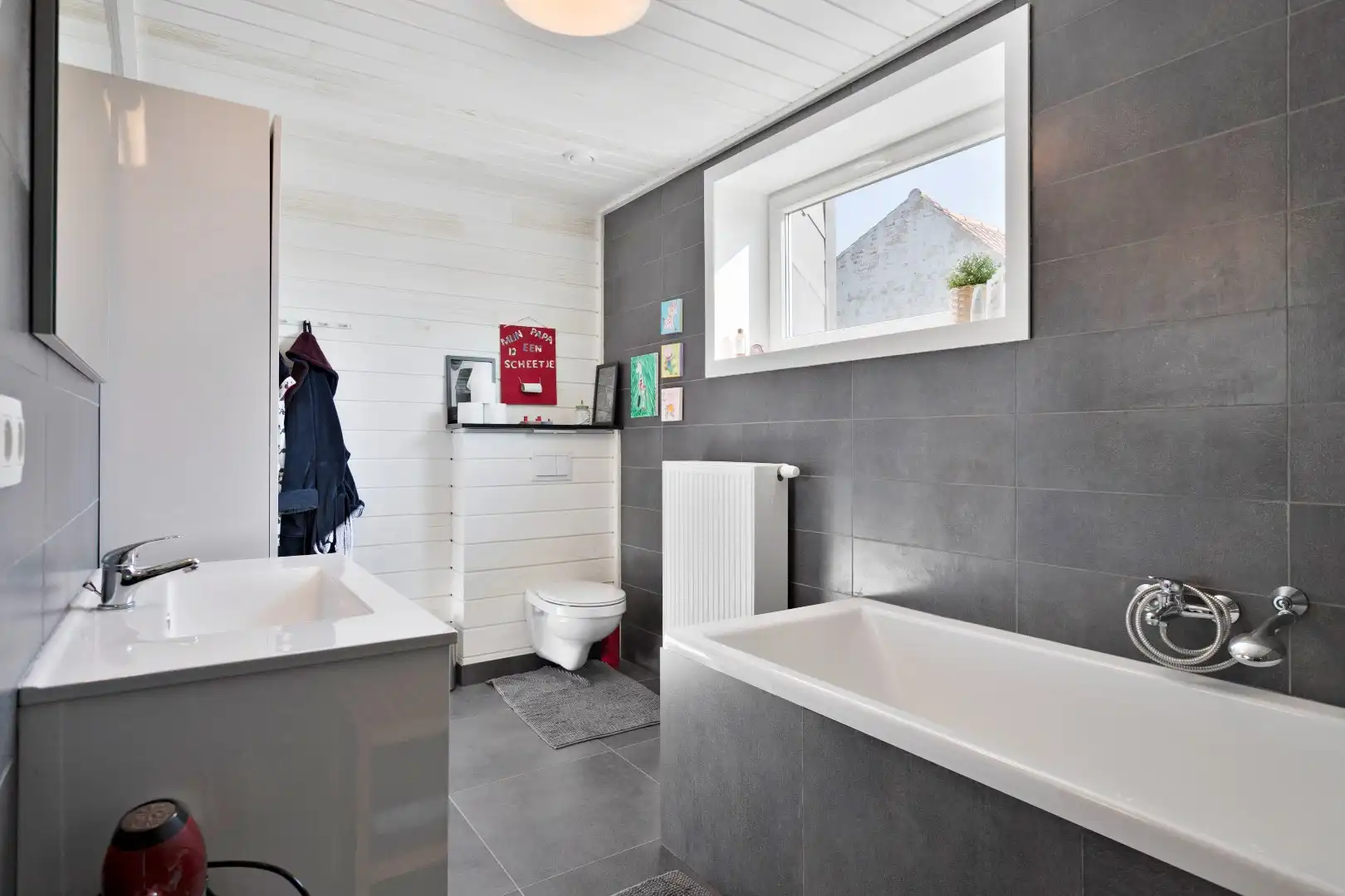 Stijlvolle gezinswoning met 3 slaapkamers en tuin. foto 13