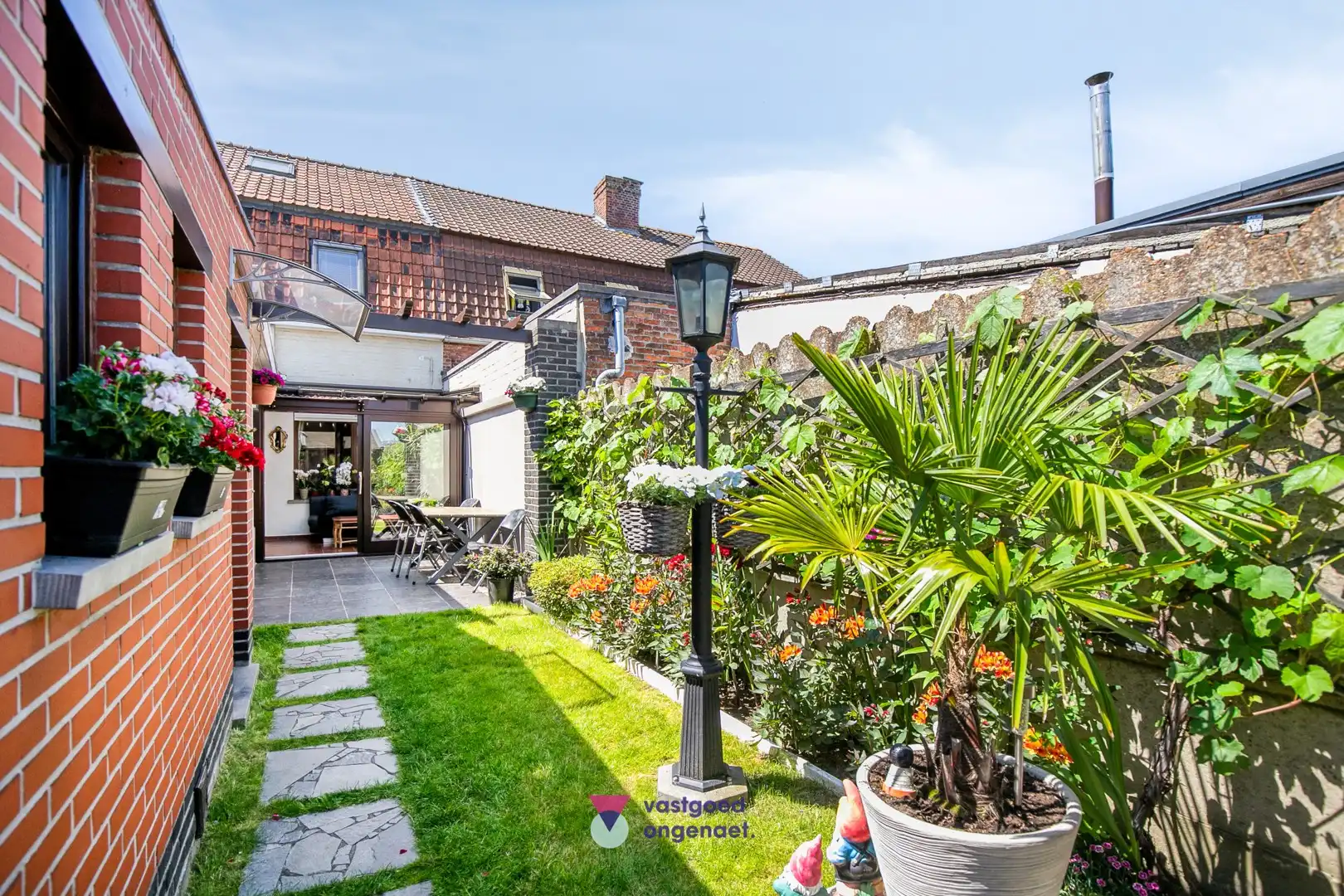 Charmante gesloten woning met zonnige tuin en garage foto 13