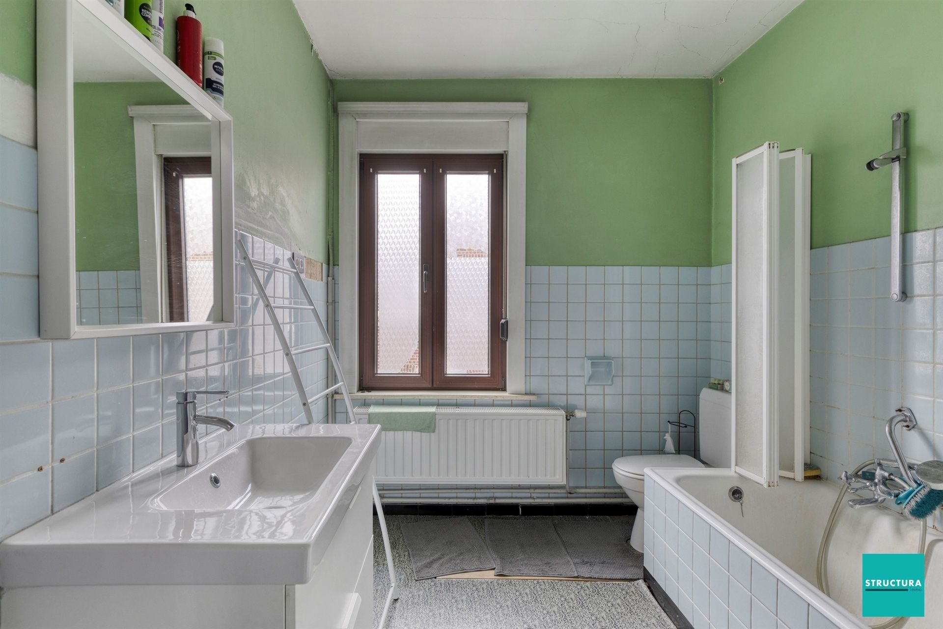 Ruime woning met potentieel in hartje Merchtem
 foto 9