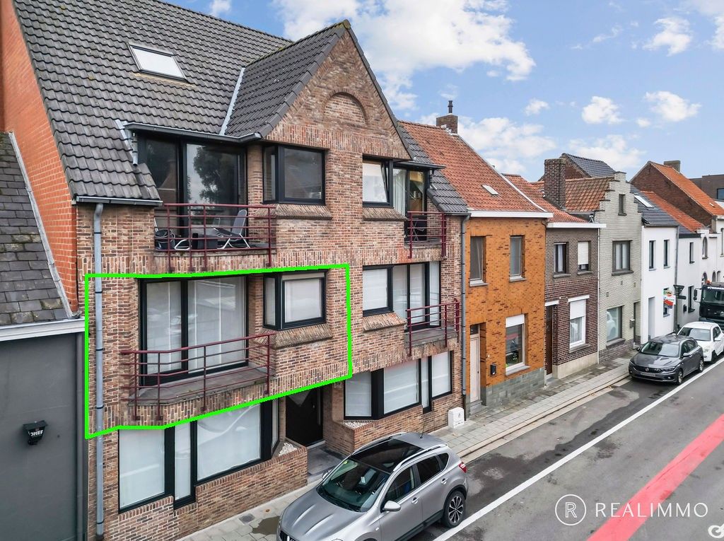 Duplexappartement met ruim terras in hartje Stasegem foto {{pictureIndex}}