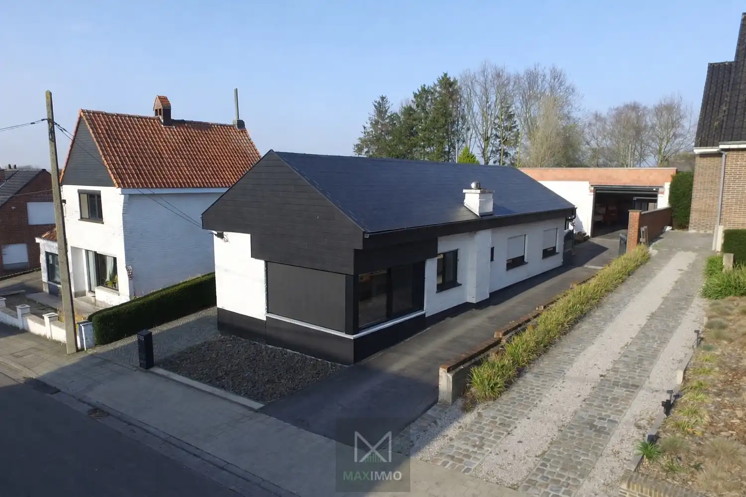 Gelijkvloerse bungalow met loods van 180 m² in het centrum van Marke foto 7