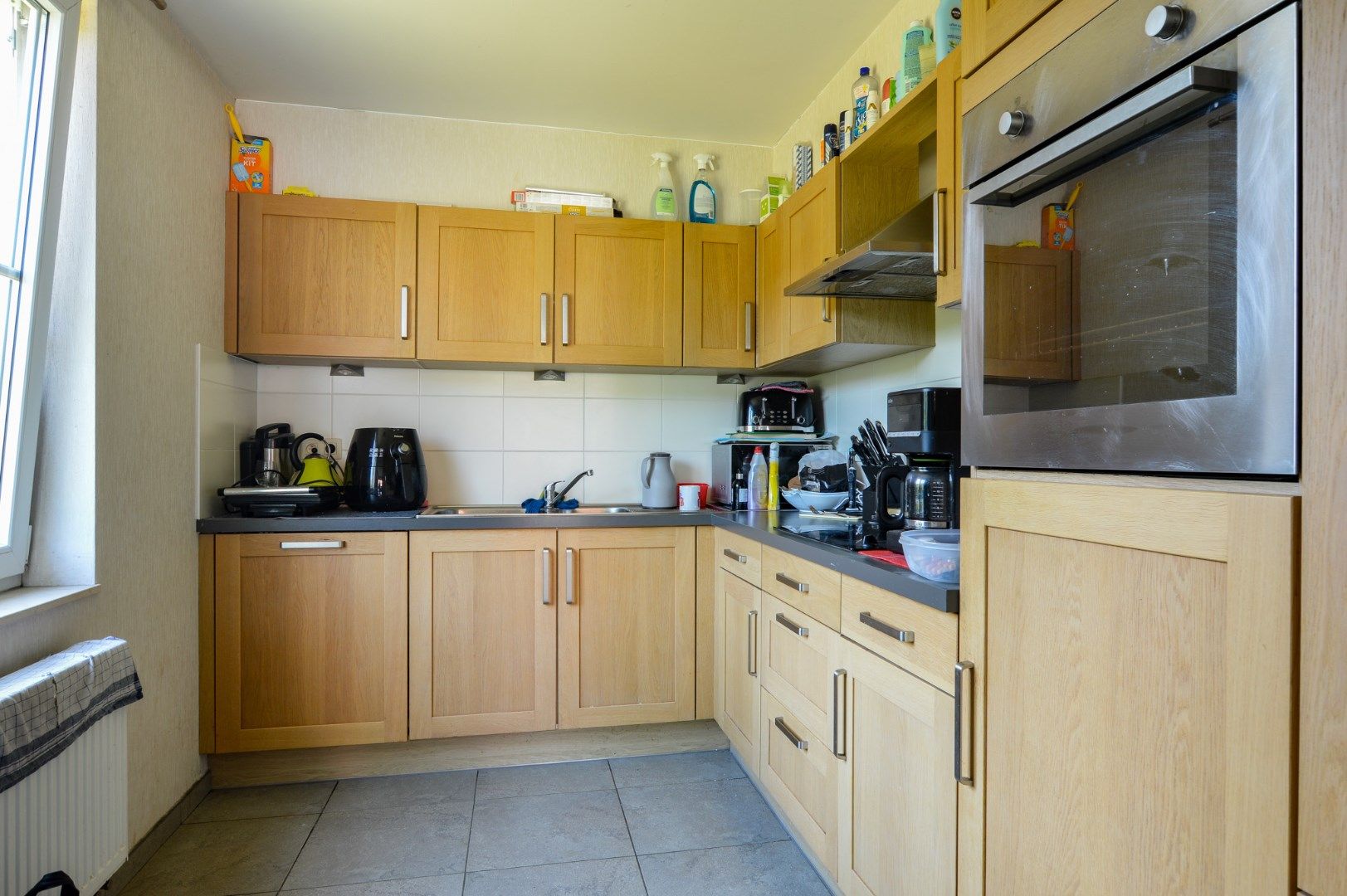 Instapklare duplex met 2 slaapkamers in het hart van Eernegem foto 4
